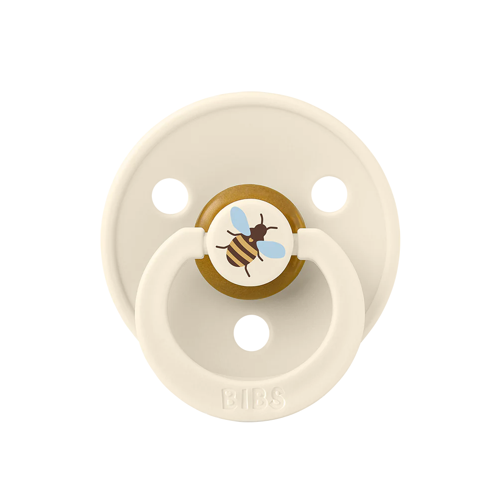 À l'unité : Suce Bibs (ronde) studio   avec 1 abeille ivoire