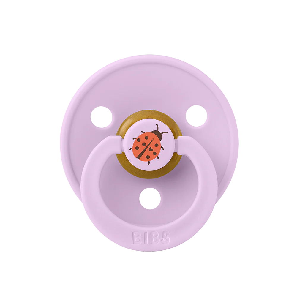 À l'unité : Suce Bibs (ronde) studio   avec 1 coccinelle violet