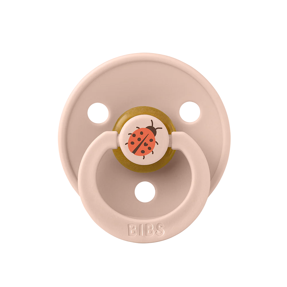 À l'unité : Suce Bibs (ronde) studio   avec 1 coccinelle blush