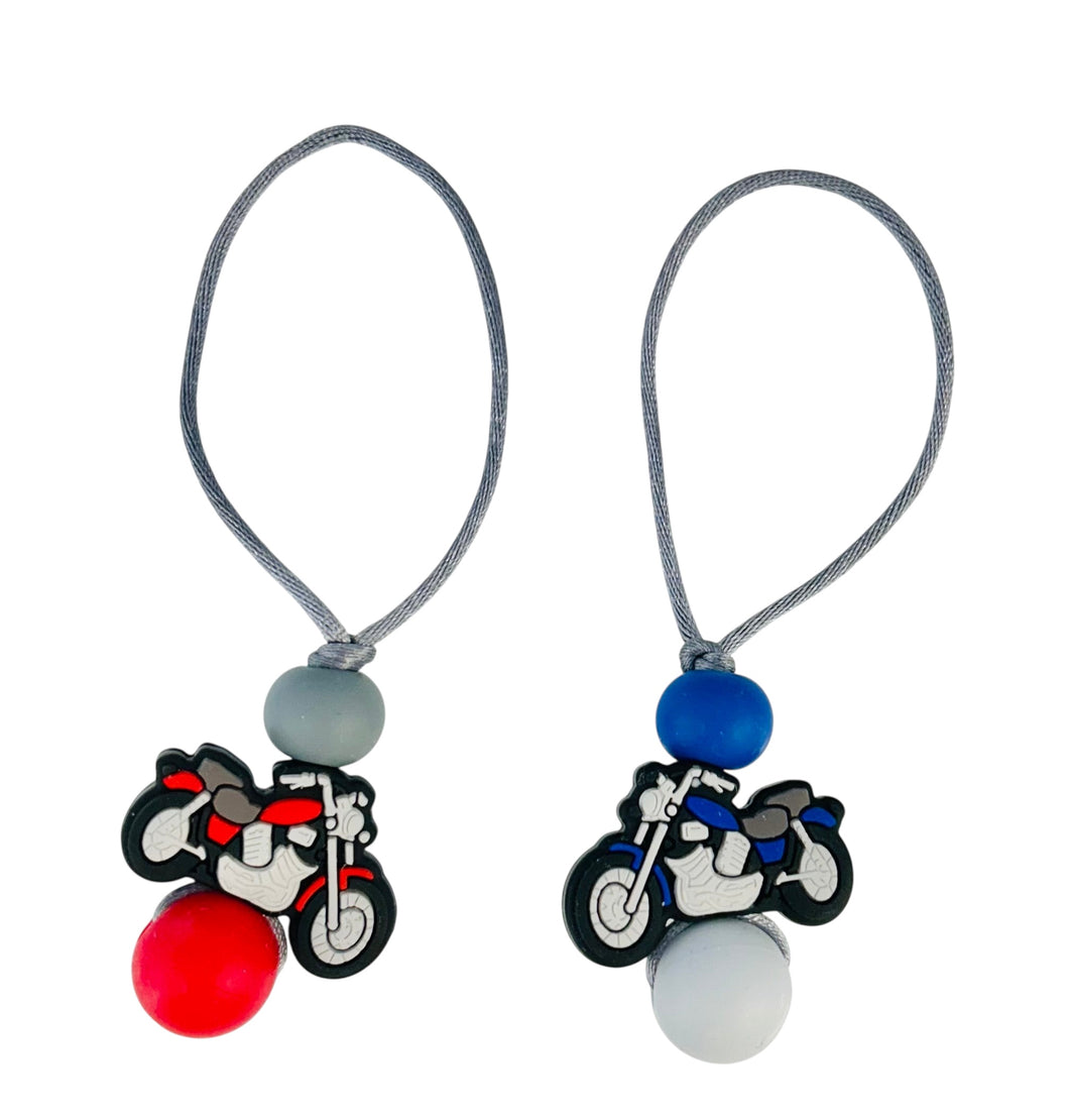 Attache zip moto