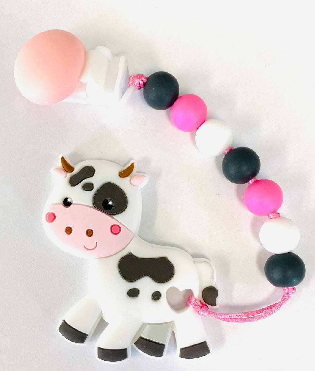 Duo attache suce et jouet de dentition vache rose