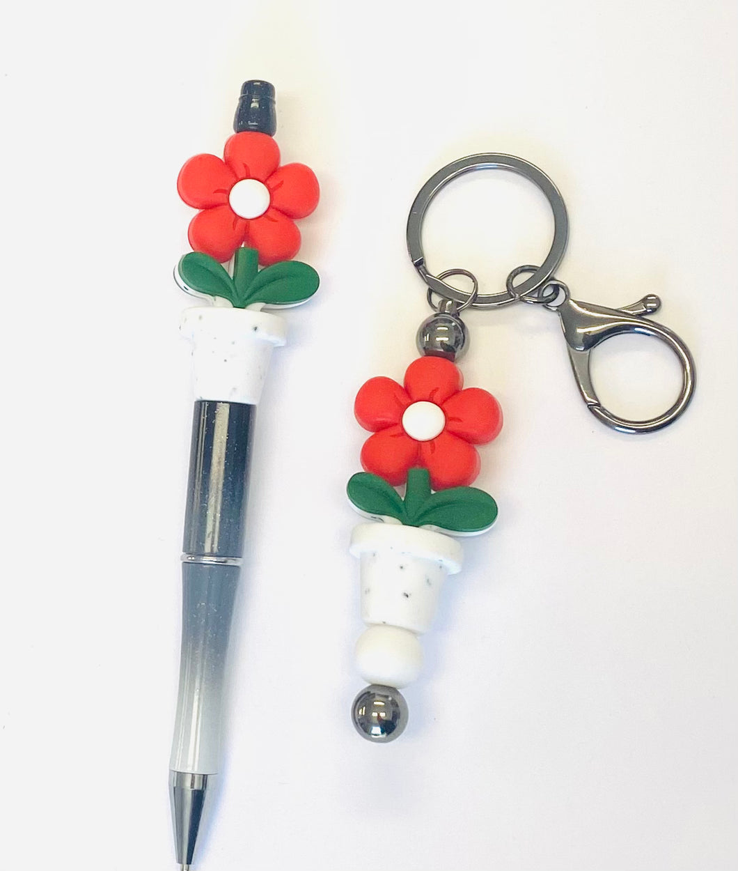 Ensemble porte-clés et stylo fleur rouge
